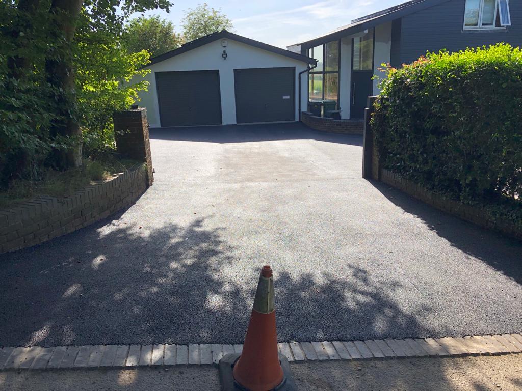 This is a photo of a bitumen driveway which is in the process of being installed by Langwarrin Road Tech